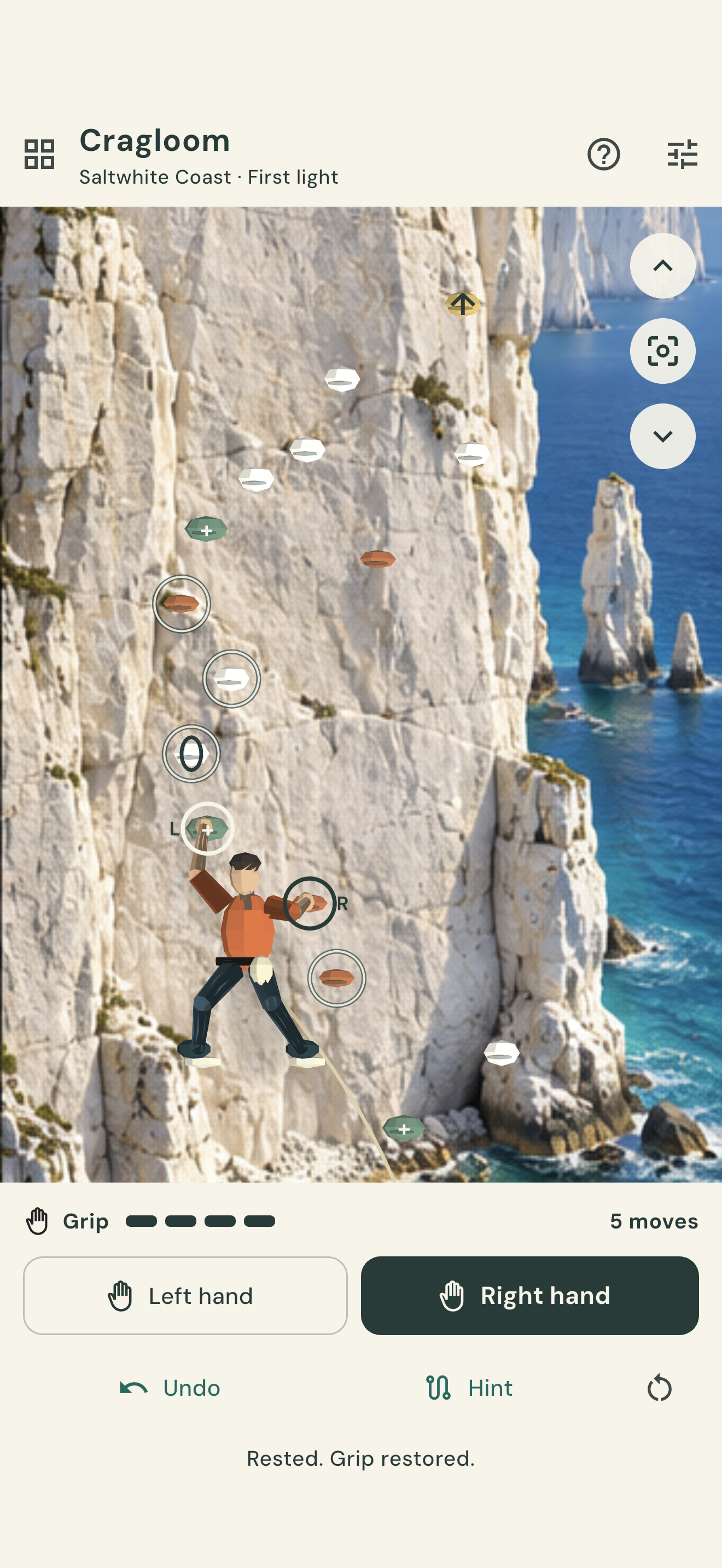 Actual coastal climbing puzzle with chalk cliffs, grip controls and a miniature climber