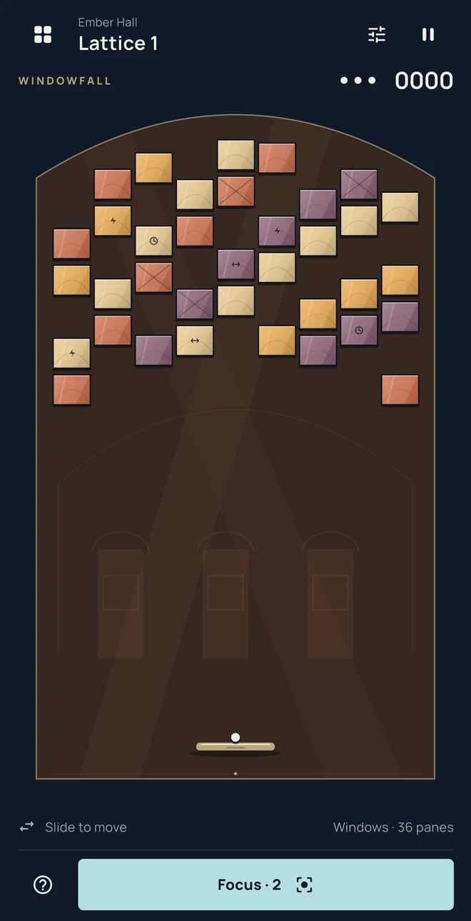Amber and rose panes with split and spark markings in Ember Hall